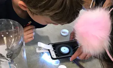 kids ussing the modquito habitat mapper app