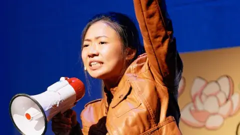 Woman holding a megaphone